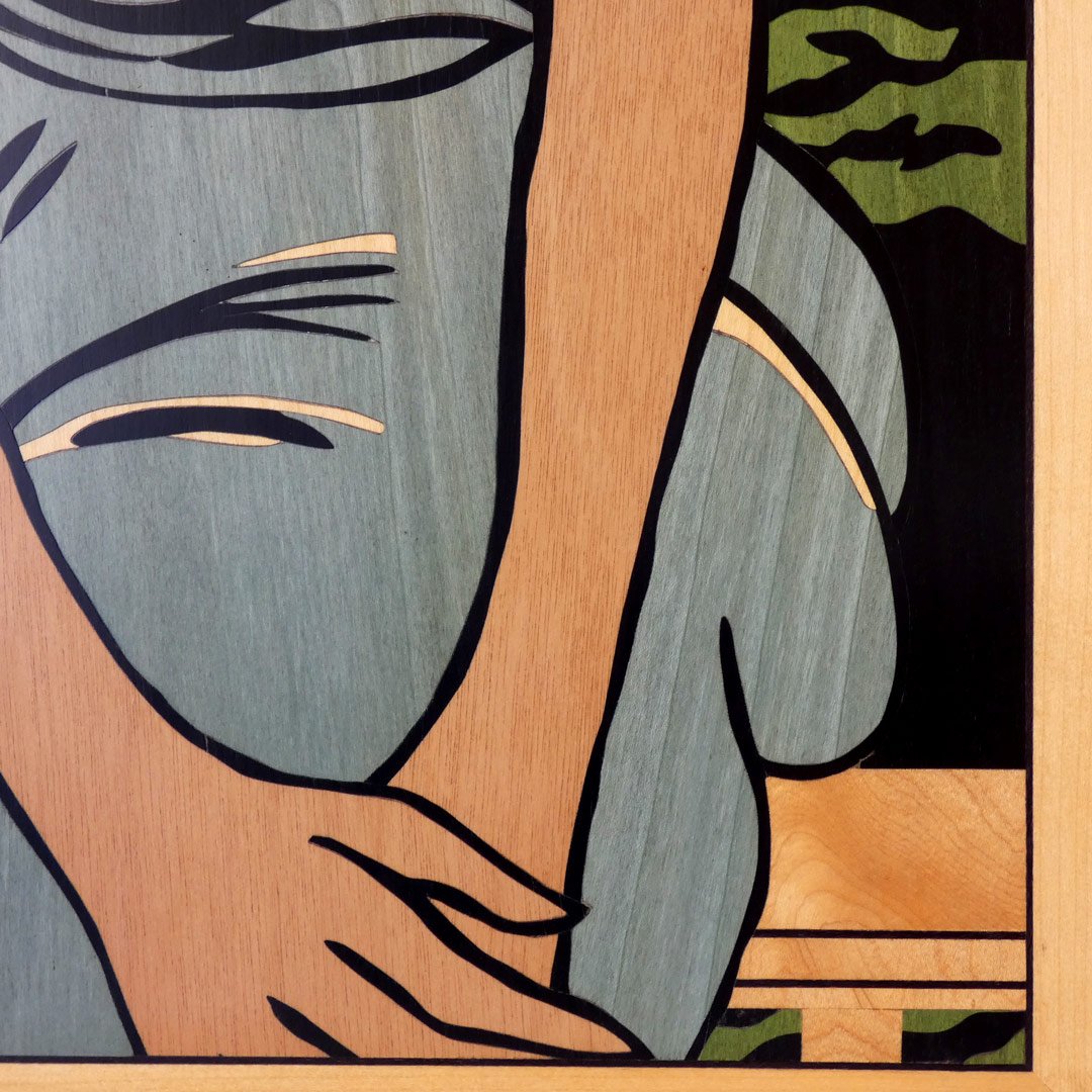 Detalle de cuadro moderno de mujer hecho en marquetería de madera