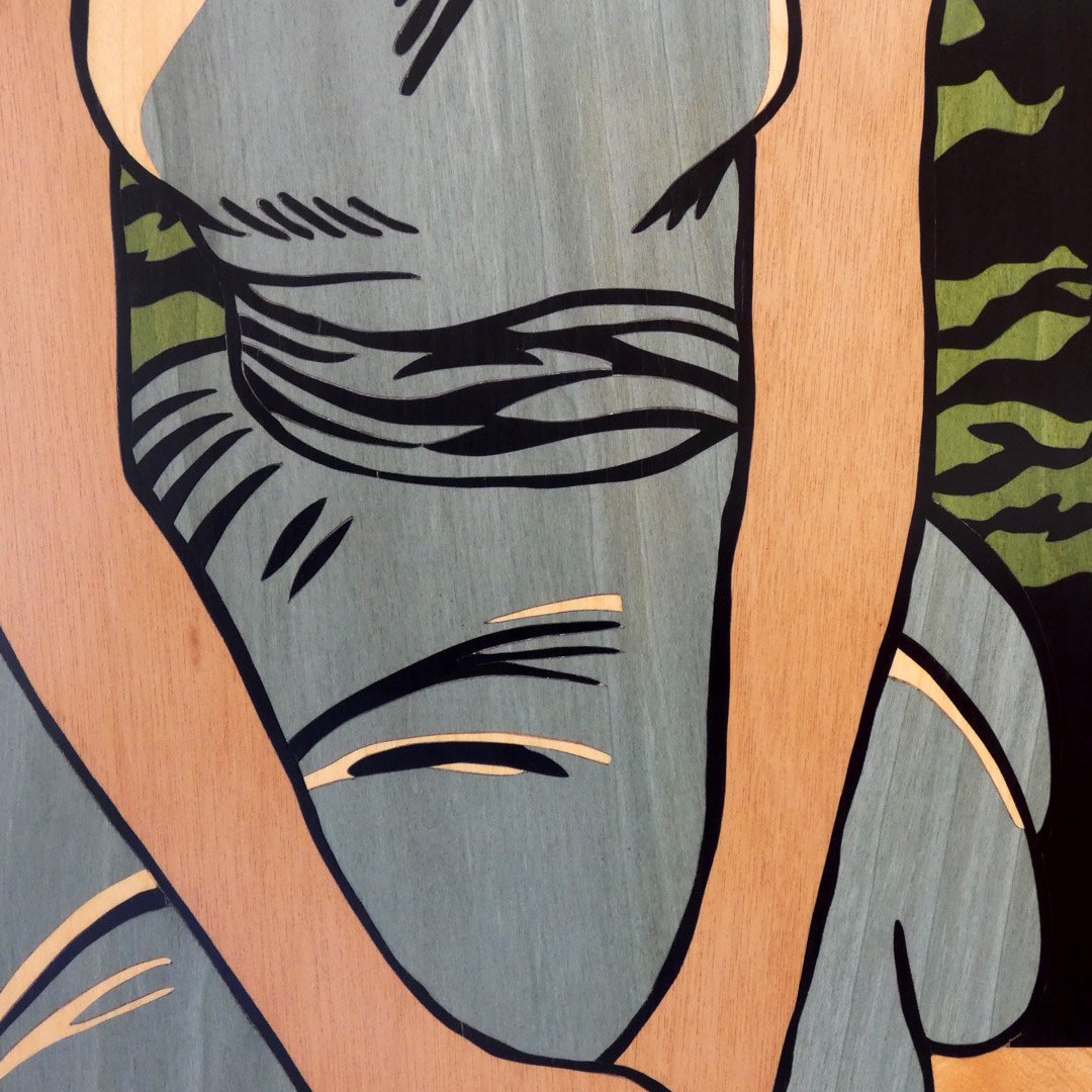 Detalle de la zona de la cintura del cuadro mujer pop art hecho a mano en marquetería
